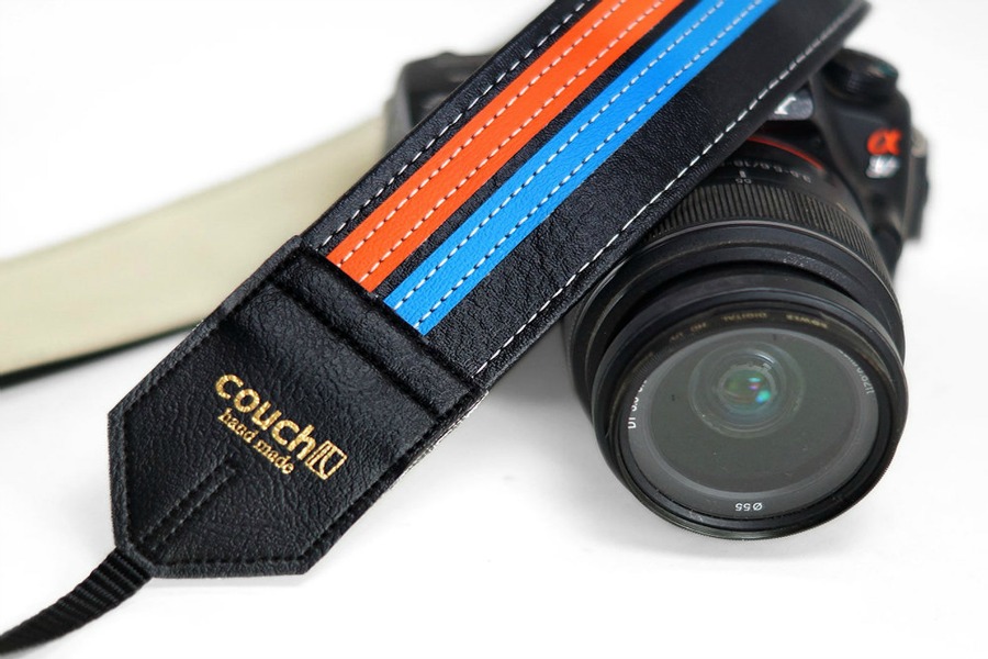 Couch handmade camera straps turn old into new.